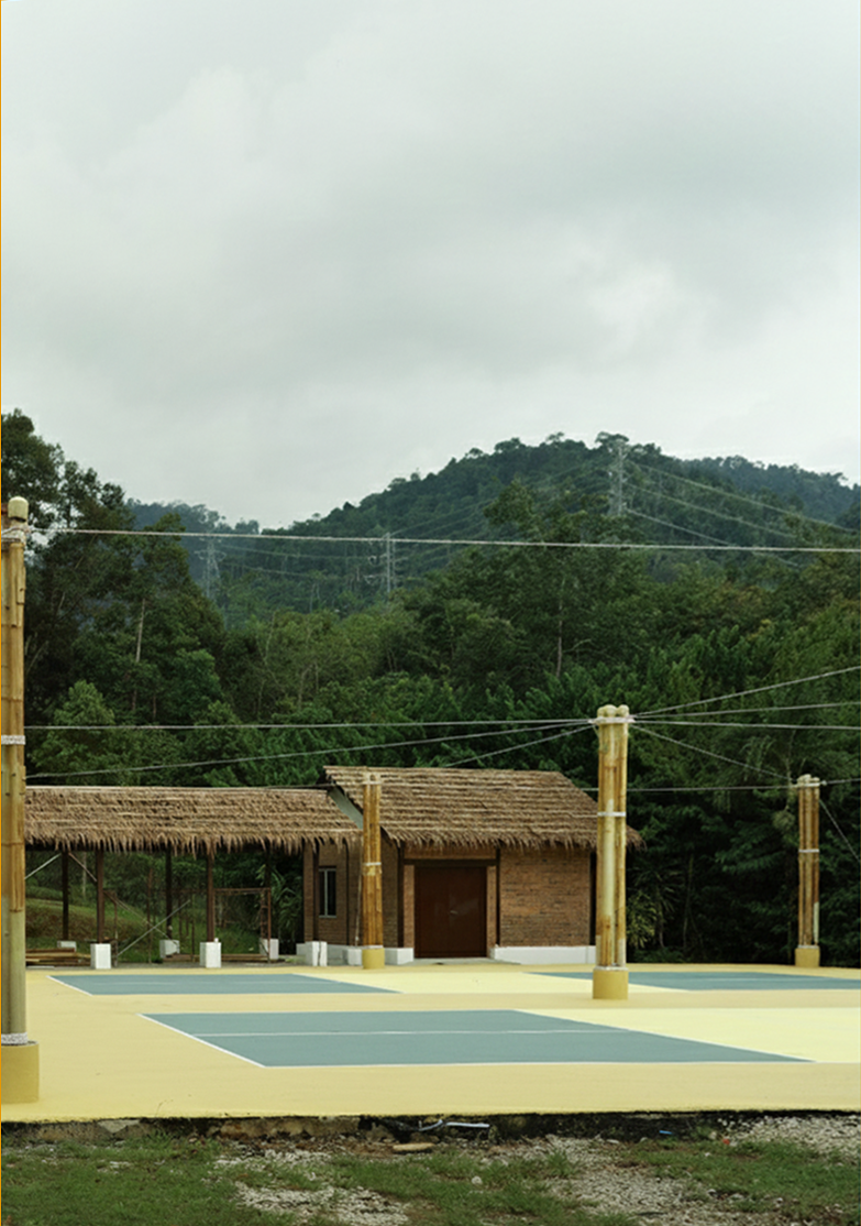 Pickleball court shaded by bamboo columns, built by DEK